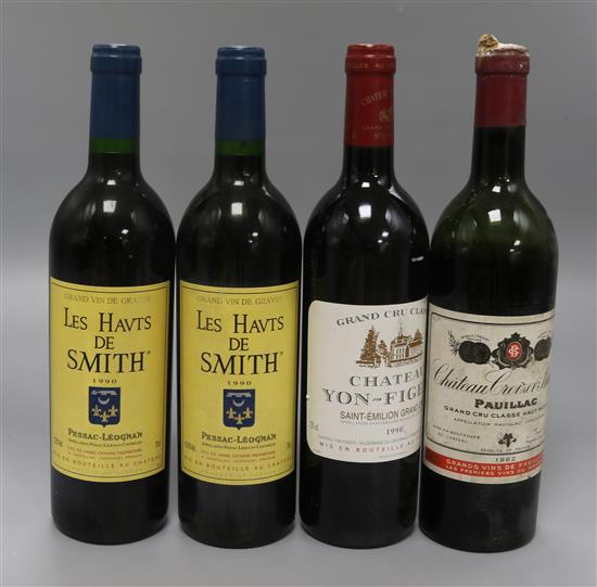 A bottle of Yon Figeac, St. Emilion, 1998, two bottles of Les Haut de Smith, 1990 and one bottle of Croiuzet Bage, 1962 (a.f.)